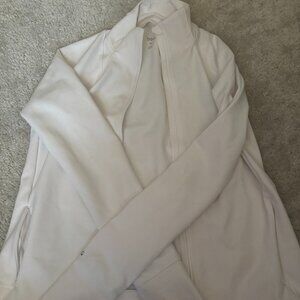 white athetic zip up